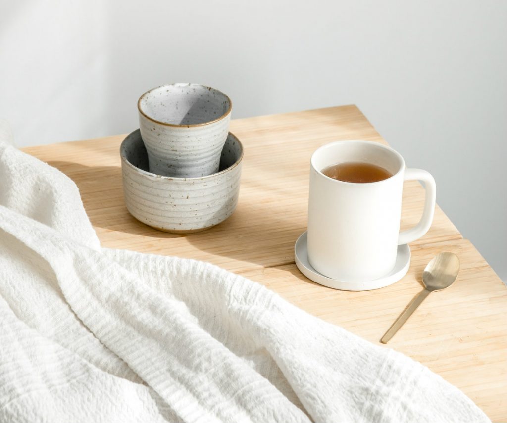 morning warm tea with unique coffee mugs