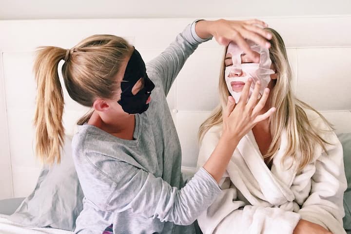 girls with face sheet masks