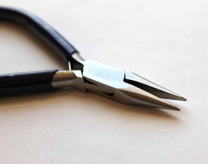 close up picture of needle nose plier