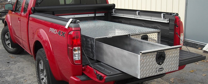 picture of a red truck with storage aluminum drawers in the back