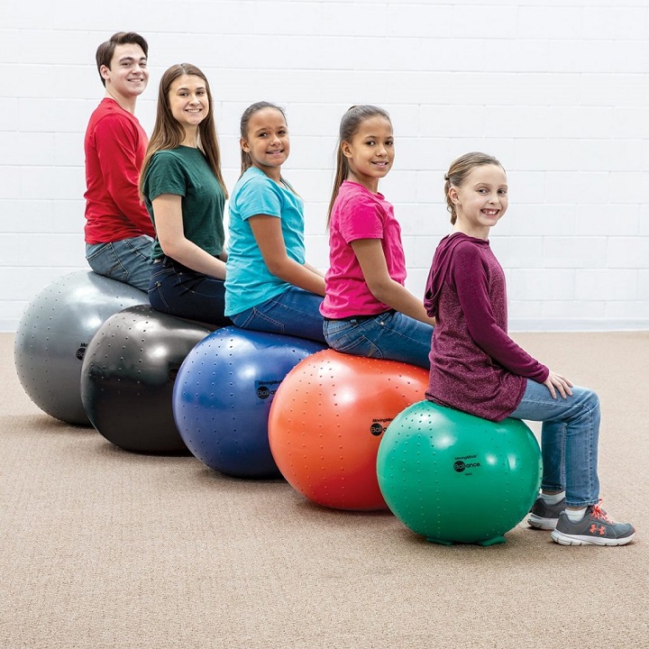 Students seating on balance balls