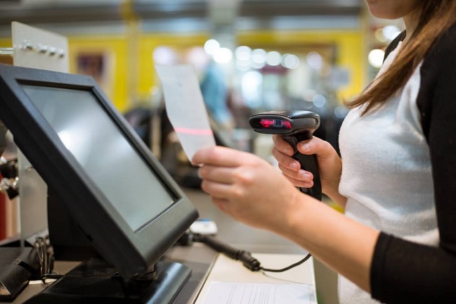 girl working on pos system