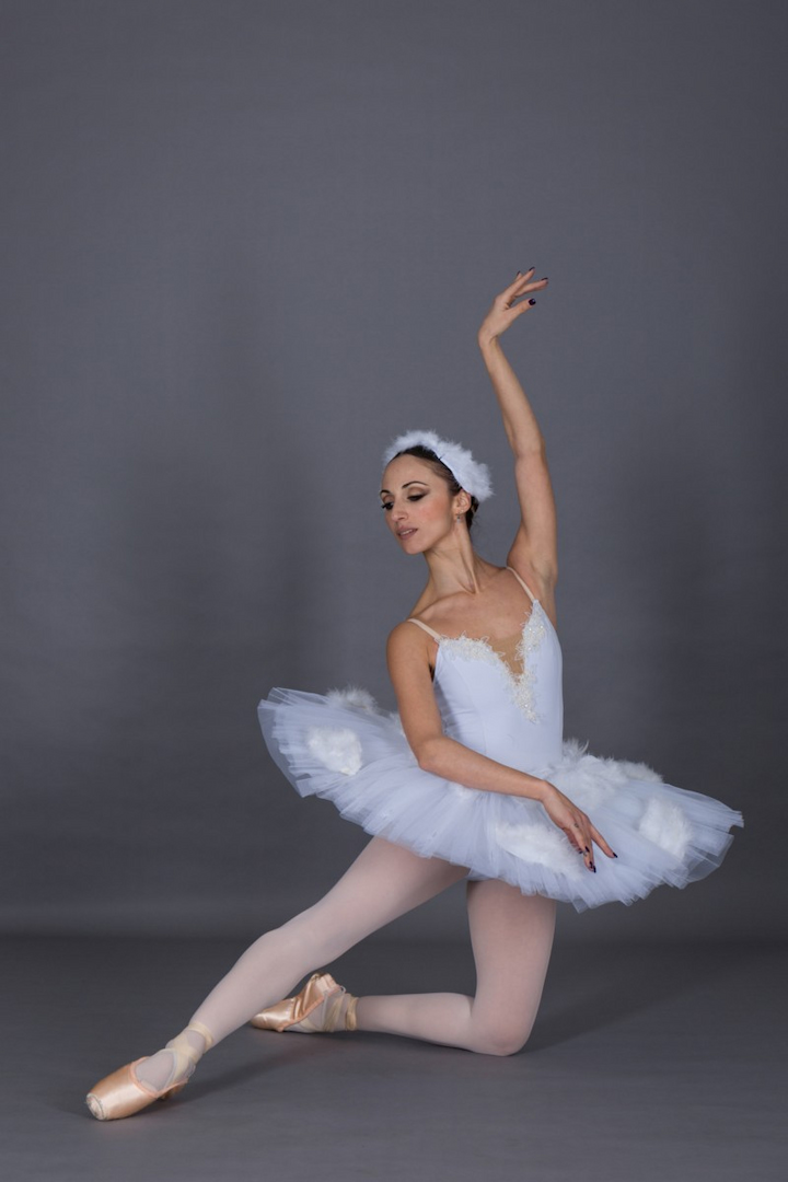 ballerina wearing white bodice white tutu with clouds