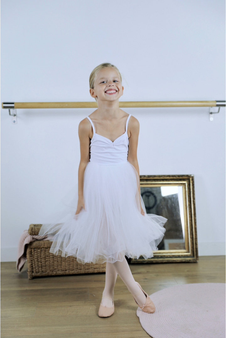 little girl wearing white romantic tutu