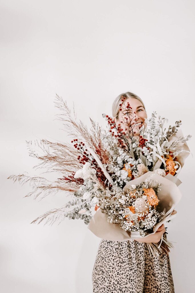 woman holding Dried Flower Bouquet