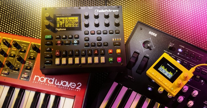 different types of synthesizers placed on a floor