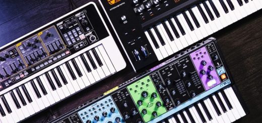 three digital synthesizers placed on a table